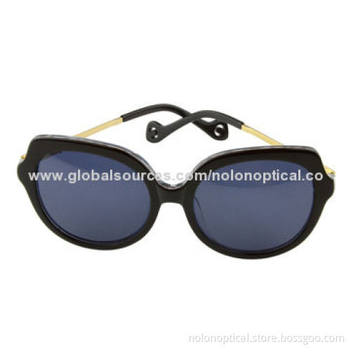 Oversize black tortoise sunglasses temple with hole deco